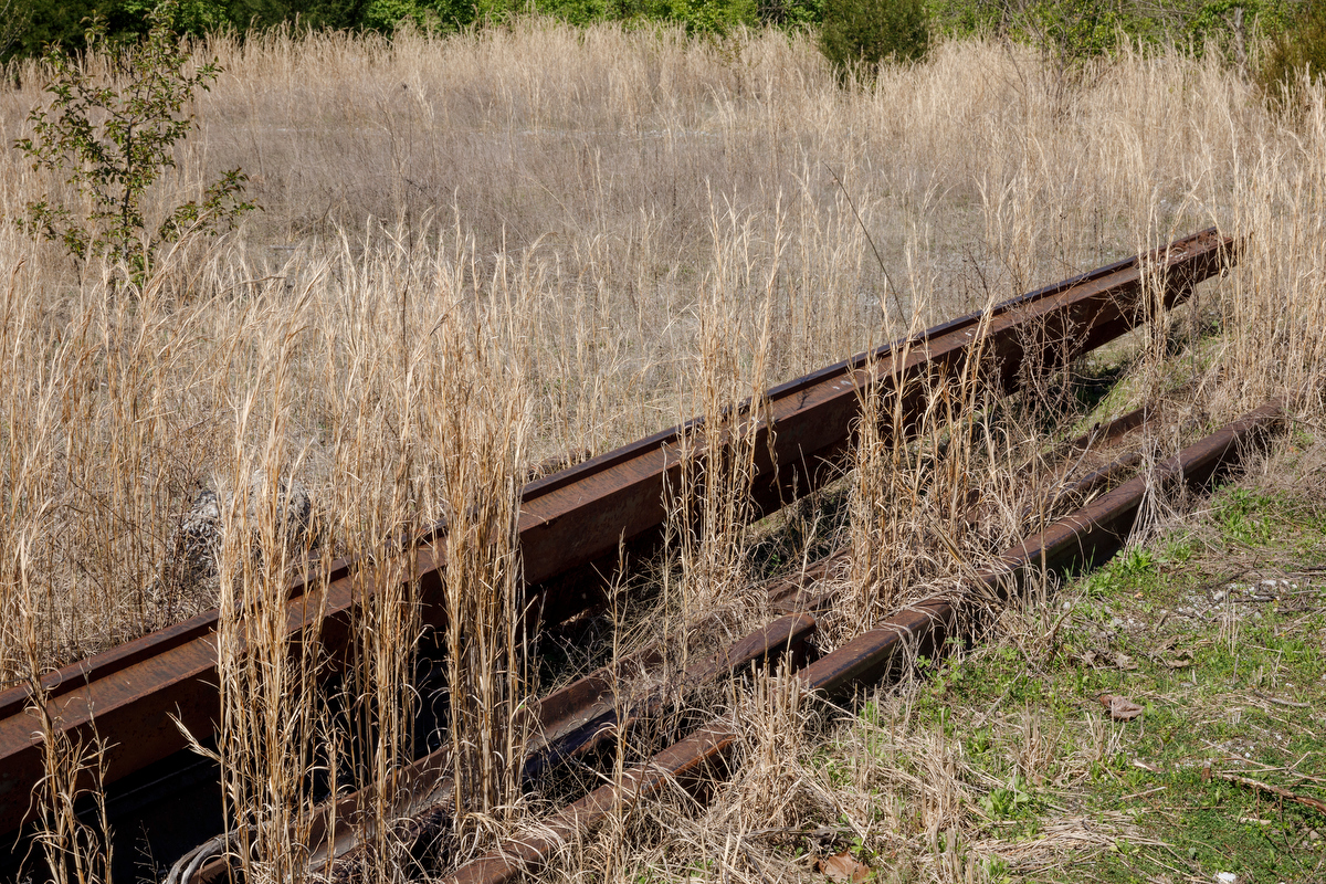 Old rail is removed to prepare a connector trail from the Wheeland Foundry Trailhead of the Tennessee Riverwalk to Alton Park on Wednesday, March 27, 2019, in Chattanooga, Tenn. Officials are looking at ways to expand the riverwalk onto the North Shore, into St. Elmo and onto Lookout Mountain.