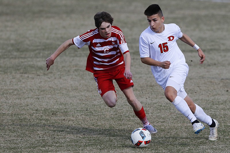 Dalton's Nathan Rincon (15) works against Baylor's Aiden Yelton (6) at Baylor School on Tuesday, April 2, 2019 in Chattanooga, Tenn.