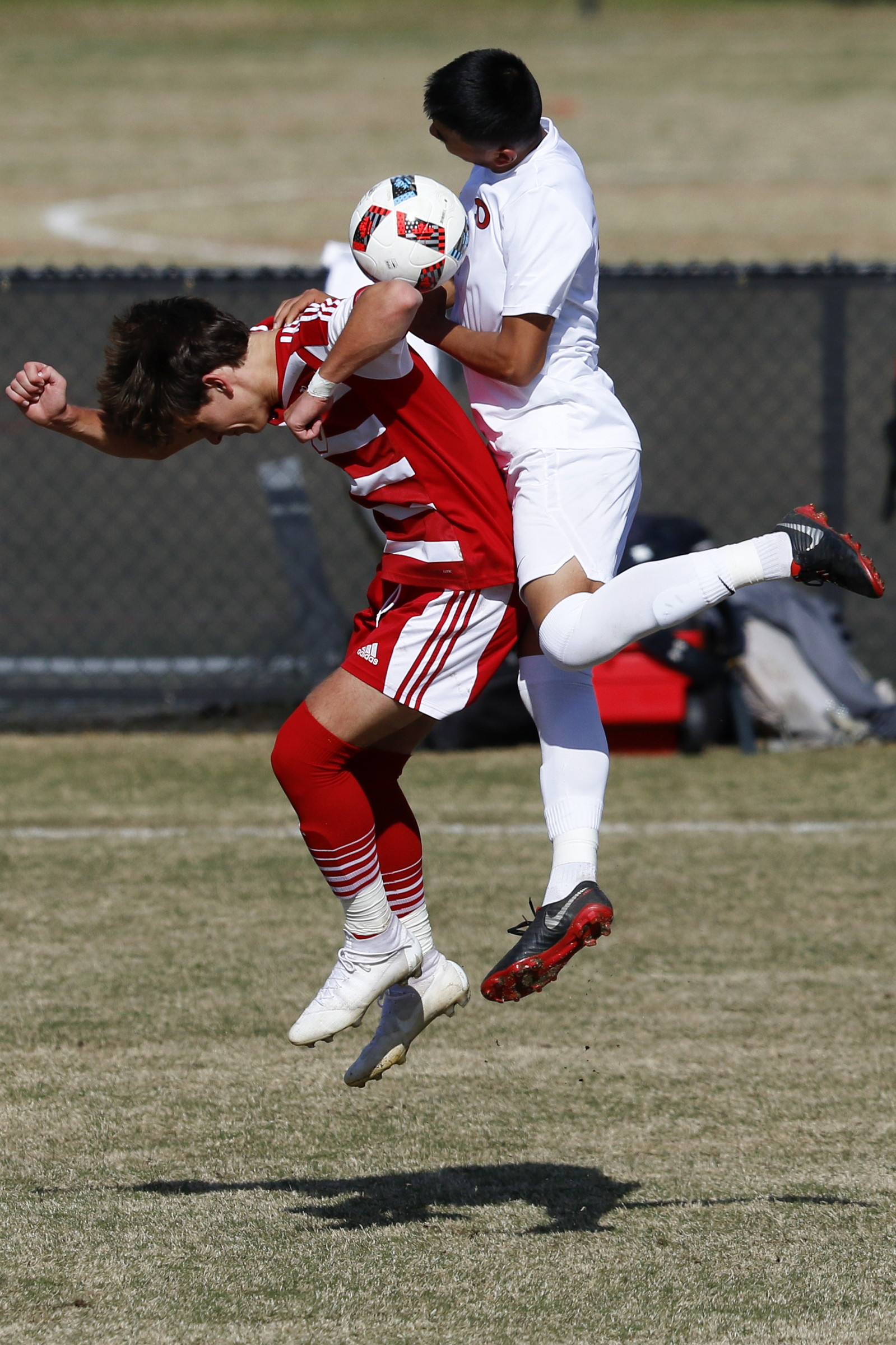 Dalton's Christian Cordova (2) fouls Baylor's Andrew Hill (3) in the air as they go for the ball at Baylor School on Tuesday, April 2, 2019 in Chattanooga, Tenn.