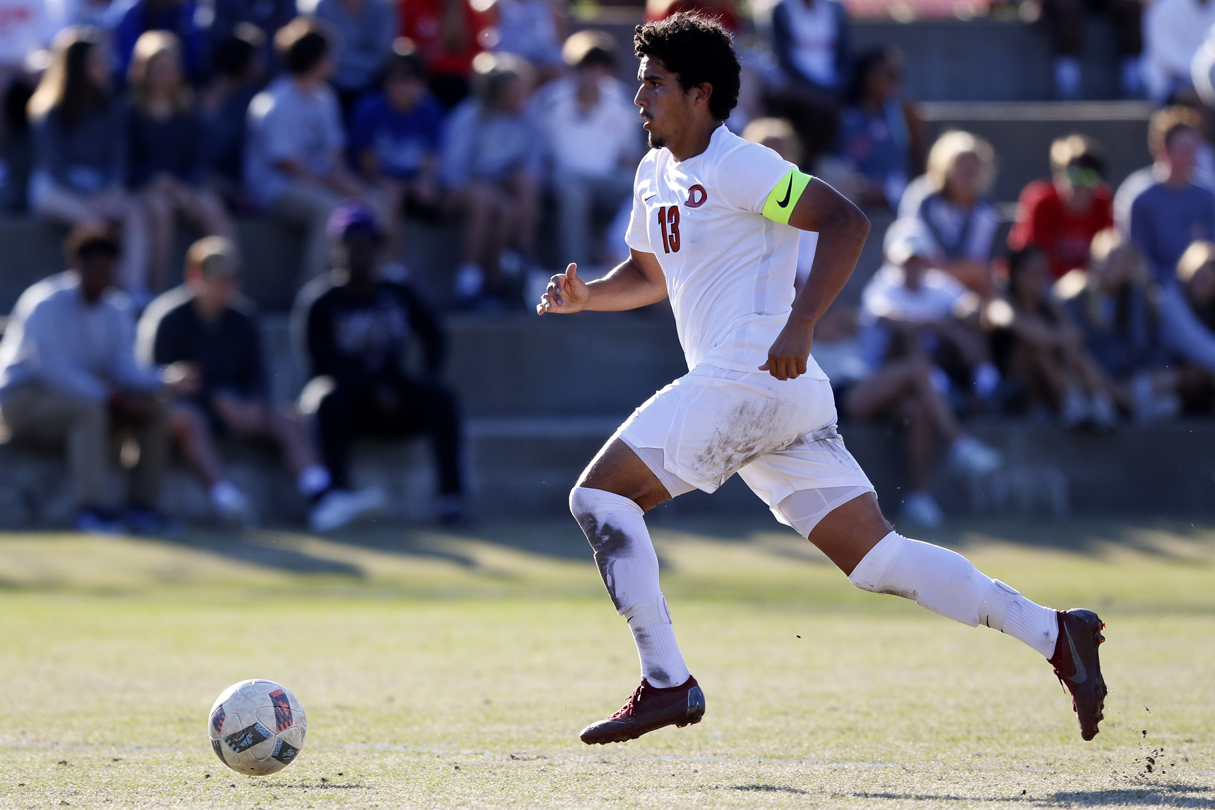Dalton's Tony Saldana (13) pushes the ball down field against Baylor at Baylor School on Tuesday, April 2, 2019 in Chattanooga, Tenn.