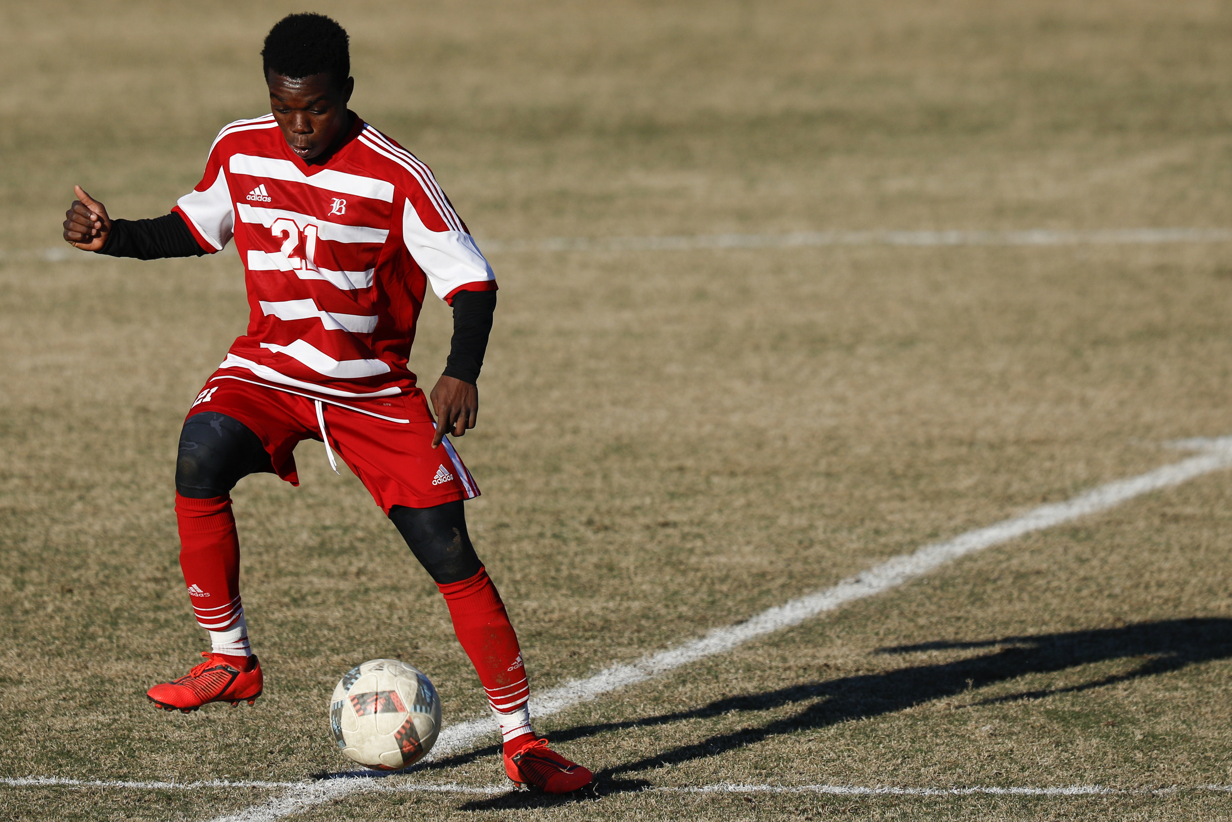 Baylor's David Danquah (21) plays the ball against Dalton at Baylor School on Tuesday, April 2, 2019 in Chattanooga, Tenn.