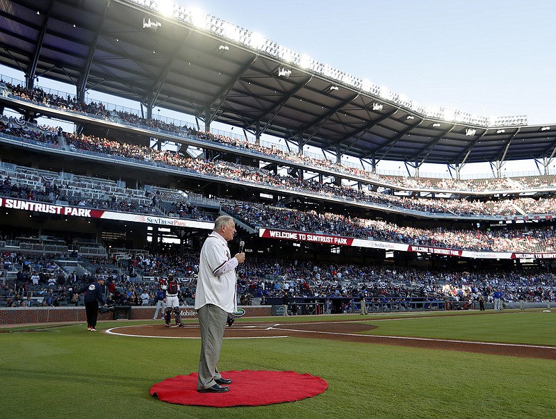 Former Atlanta Braves manager Bobby Cox, a Hall of Famer, gives the command to "Play ball!" before the team's 2019 home opener against the Chicago Cubs on Monday night.