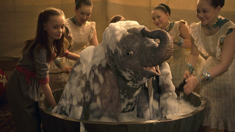 This image released by Disney shows Nico Parker, left, in a scene from "Dumbo." (Disney via AP)