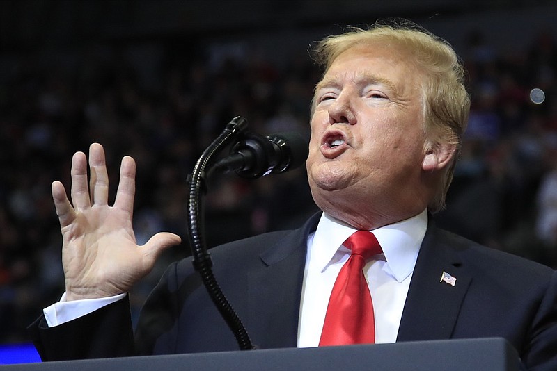 In this March 28, 2019, photo, President Donald Trump speaks at a campaign rally in Grand Rapids, Mich. Trump is suggesting he will defer until after 2020 his push for a Republican health care plan to replace the Affordable Care Act. Trump tweeted late Monday that Congress will vote on a GOP plan after the elections, "when Republicans hold the Senate & win back the House." (AP Photo/Manuel Balce Ceneta)