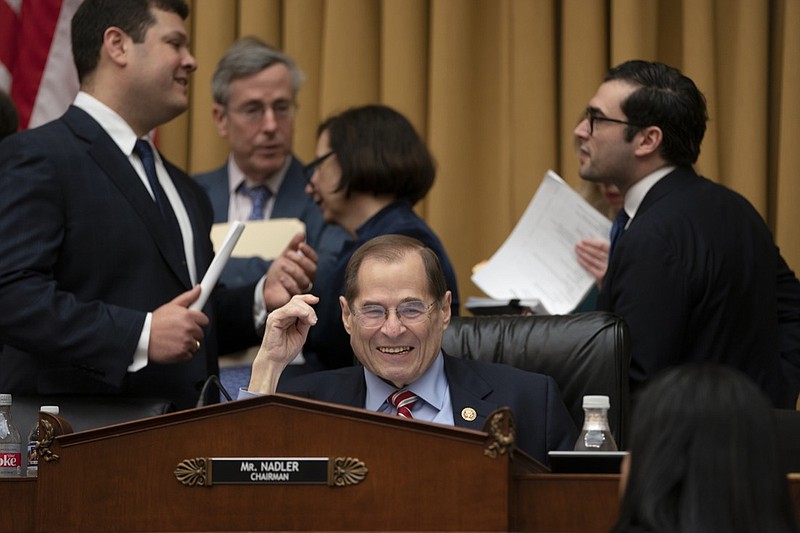 House Judiciary Committee Chair Jerrold Nadler, D-N.Y., surrounded by his staff, passes a resolution to subpoena special counsel Robert Mueller's full report, on Capitol Hill in Washington, Wednesday, April 3, 2019. (AP Photo/J. Scott Applewhite)