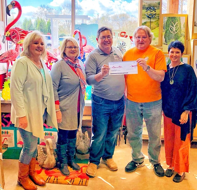 The River City Parrot Head Club presented a check for $3,622.70 to the Lana's Love Foundation, which supports children fighting cancer and their families. The money was raised with a trivia competition on March 8 at VFW Post 4848 on Amnicola Highway. River City Parrot Head Club is the local chapter of the Jimmy Buffett fan club. From left are Kim Fischer, River City Parrot Head Club; Cindy and John Webster, founders of Lana's Love; Louvain Edmondson, River City Parrot Head Club; and Holly Shull, director of Lana's Love Foundation. / RCPHC contributed photo