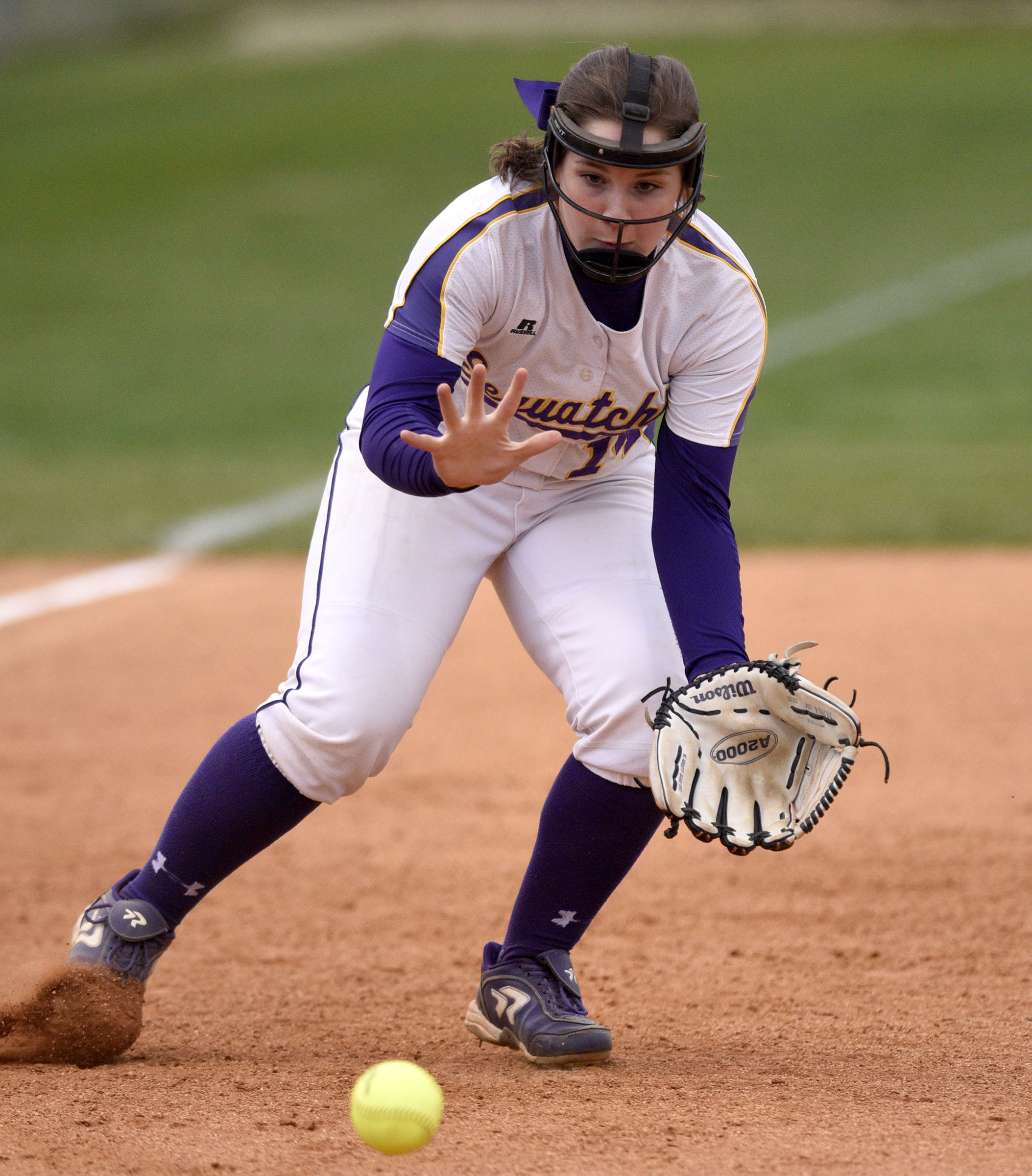 Sequatchie third baseman Abbie McGowan (14) moves to field a ground ball. The Marion County High Lady Warriors visited the Sequatchie County Lady Indians in TSSAA softball action on April 4, 2019.