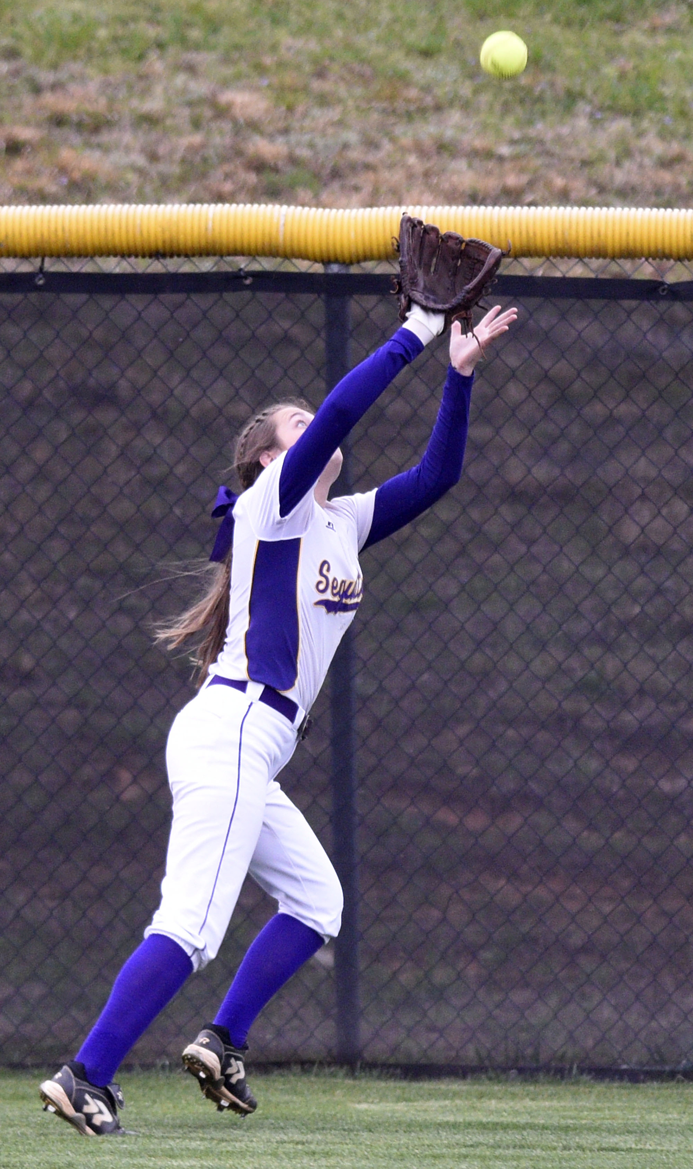 Sequatchie left fielder Jadeyn Girdley (2) pulls in a long fly ball. The Marion County High Lady Warriors visited the Sequatchie County Lady Indians in TSSAA softball action on April 4, 2019.