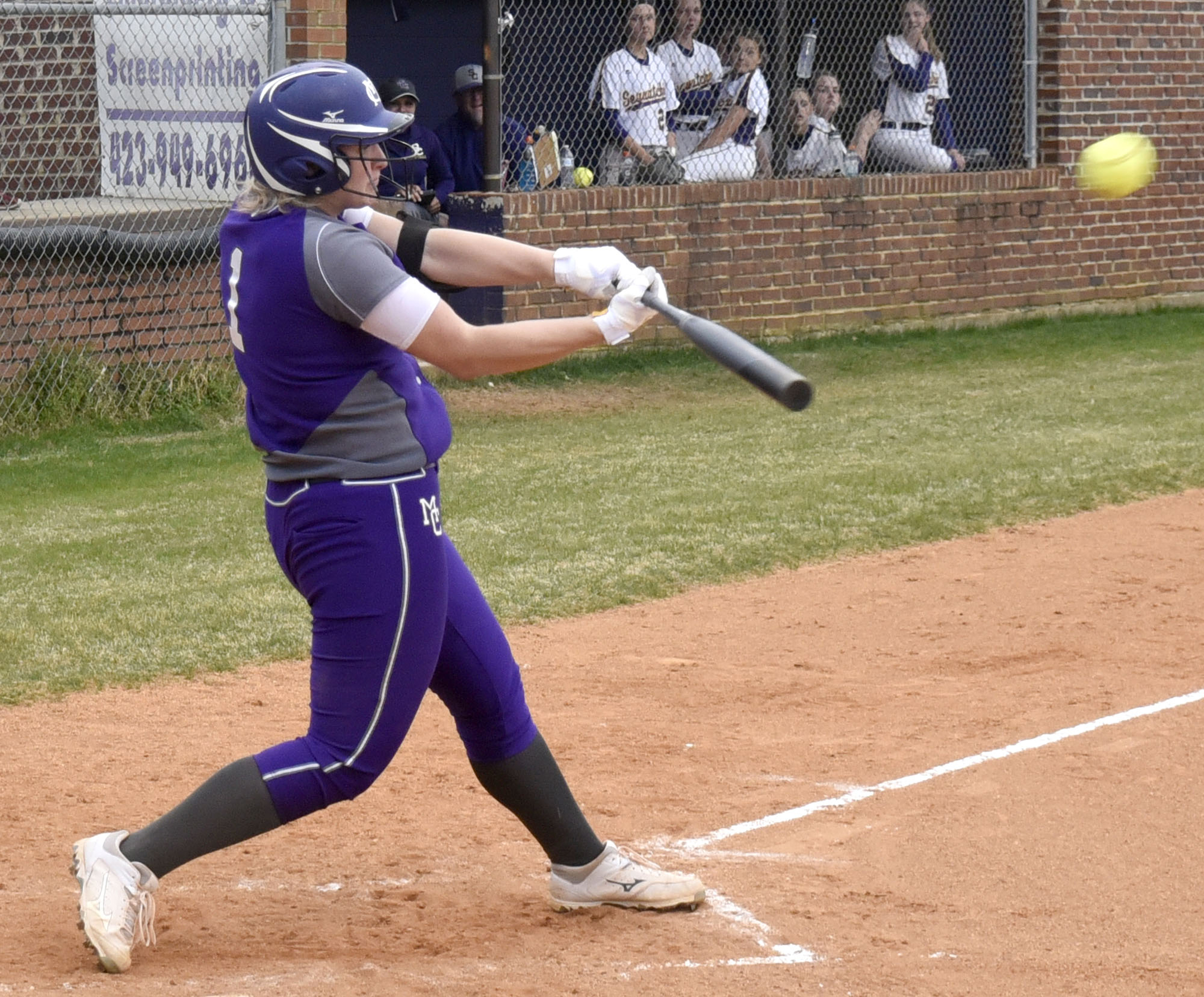 Marion County's Sara Muir (1) hits a solo home run. The Marion County High Lady Warriors visited the Sequatchie County Lady Indians in TSSAA softball action on April 4, 2019.
