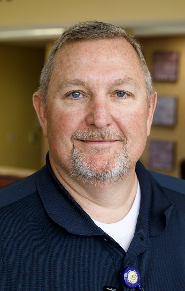 Director of Emergency Services Dale Solomon poses for a portrait at Parkridge East on Thursday, April 4, 2019, in Chattanooga, Tenn. The room includes special features like sound-proofing, calming lighting and a weighted blanket to accommodate patients with autism and sensory sensitivity.