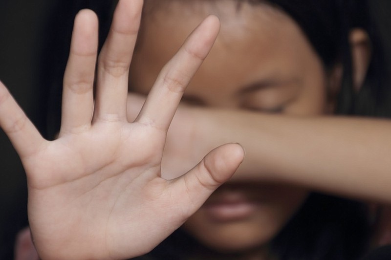 
Little girl suffering bullying raises her palm asking to stop the violence assault tile violence domestic assault abuse sexual assault rape sexual violence tile / Getty Images