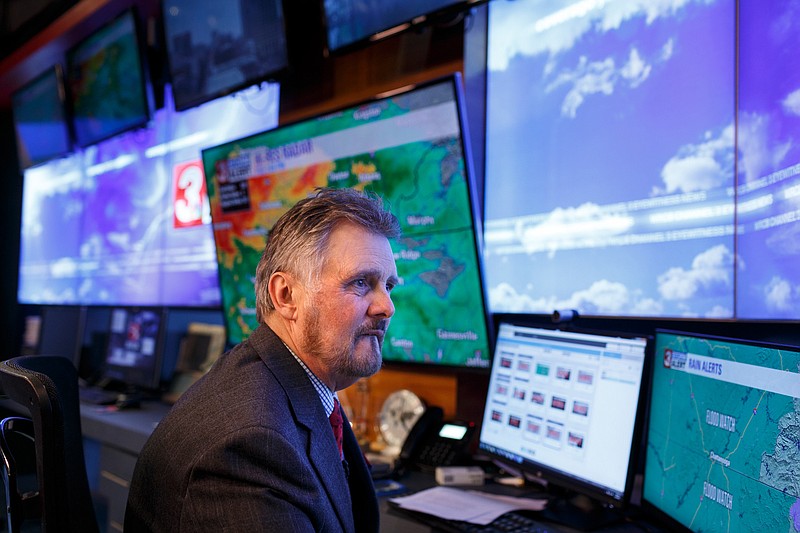 Chief Meteorologist Paul Barys monitors weather conditions before a broadcast from the studio of the WRCB Channel 3 Eyewitness News television station on Tuesday, Feb. 19, 2019, in Chattanooga, Tenn. Barys's broadcast focused on a forecast of heavy rain for the week across the Chattanooga viewing area.