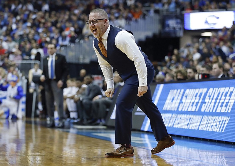 Buzz Williams coaches the Virginia Tech men's basketball team in its NCAA tournament game against overall No. 1 seed Duke on March 29 in Washington. Williams is now the head coach at Texas A&M.