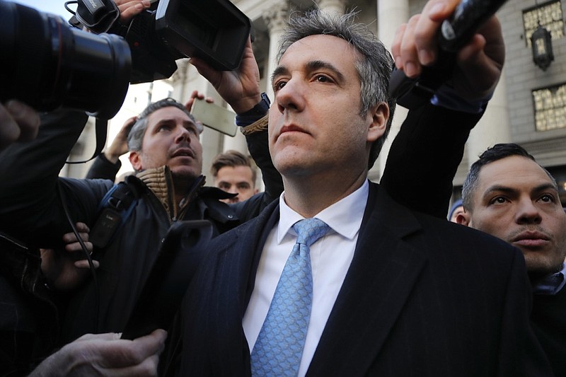 In this Nov. 29, 2018, file photo, Michael Cohen walks out of federal court in New York. A year ago Tuesday, April 9, 2019, FBI agents raided Cohen's home and office and some pundits declared it the beginning of the end of Donald Trump's presidency. And yet, there are mounting indications that Cohen's usefulness to federal prosecutors is drying up. (AP Photo/Julie Jacobson, File)