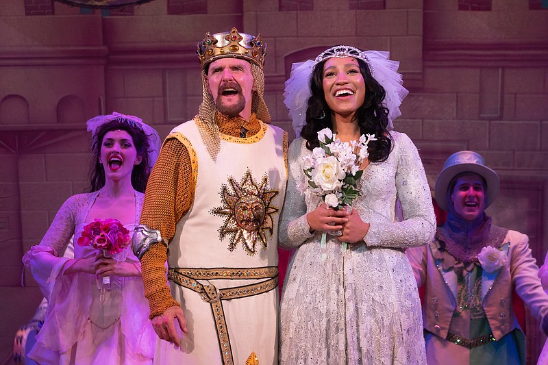 King Arthur, played by Steve McKay, marries the Lady of the Lake, played by Leslie Jackson, in "Spamalot." / Spamalot National Tour photo