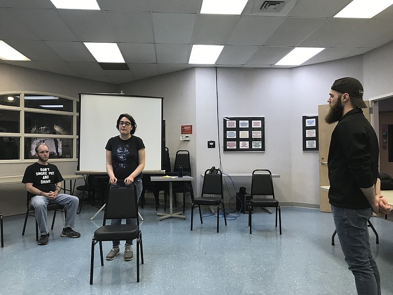 Rehearsing a scene from "The Christians" are, from left, Zack Greene, Ashley Burkhart and James Ogden. / ETC contributed photo