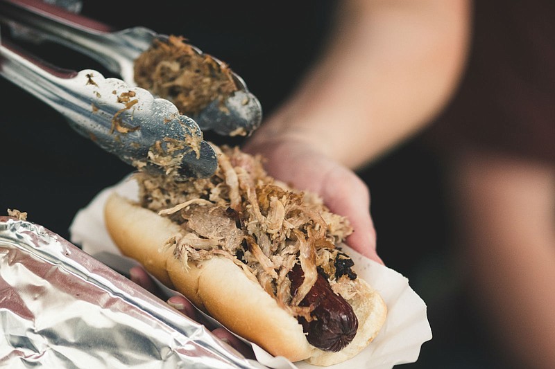 Every food vendor must serve at least three bacon-inspired dishes - such as this pork-on-pork hot dog. Bacon Festival of Cleveland contributed photo