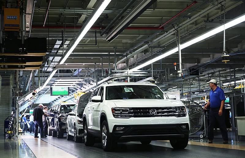 Vehicles move down the assembly line at the Volkswagen Plant Thursday, Aug. 31, 2017, in Chattanooga, Tenn. 