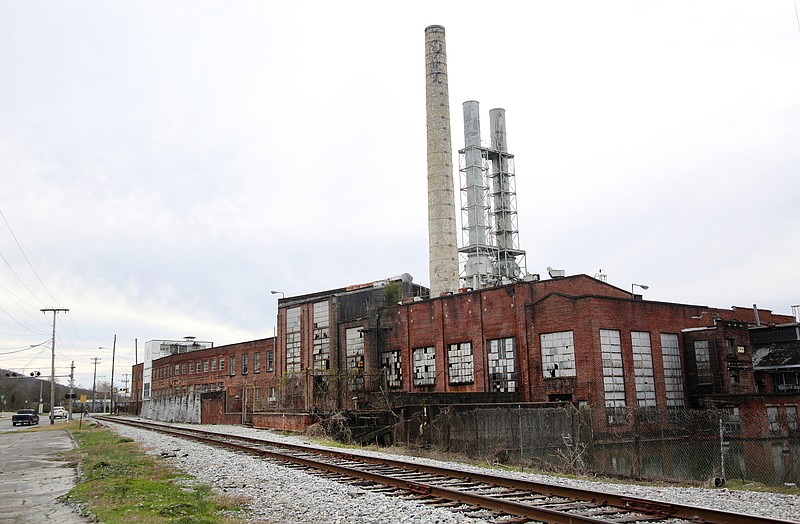 Staff photo by Erin O. Smith / The Peerless Woolen Mills sits alongside McFarland Avenue Monday, February 18, 2019 in Rossville, Georgia. Developers bought the 1.2-million-square-foot in 2017, but haven't taken any significant steps in changing how the facility is used.