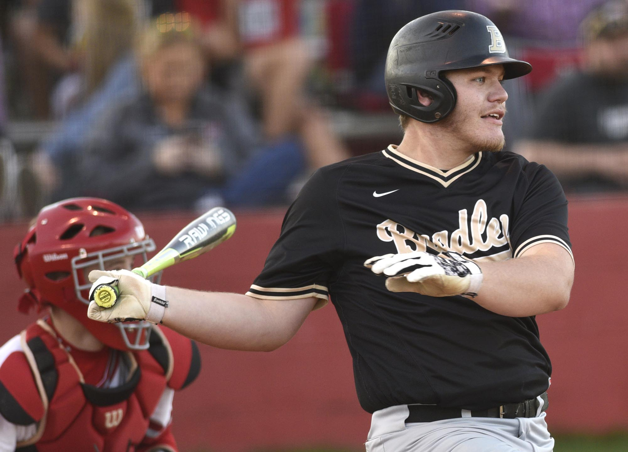 Bradley's Jake Thompson (29) follows through after making contact. The Bradley Central Bears visited the Ooltewah Owls in TSSAA baseball action on April 9, 2019.
