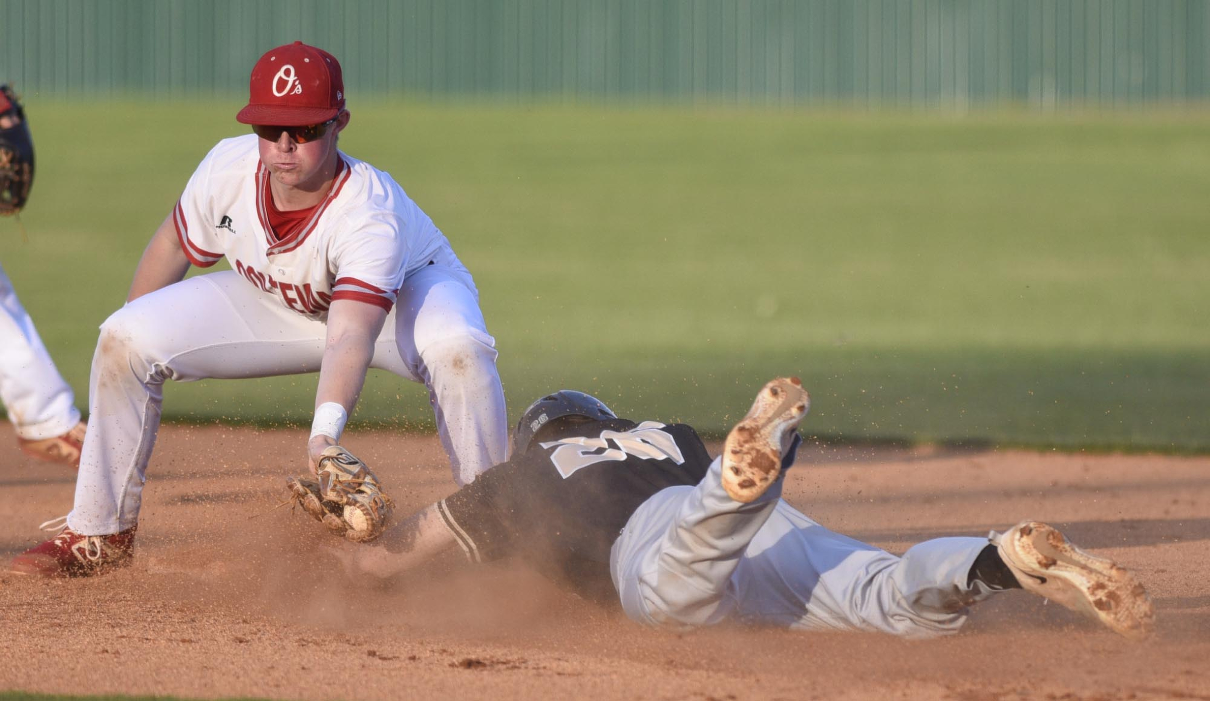 Bradley's Tucker Still (26) is safe at second as Jacob Robinson (7) is late with the tag. The Bradley Central Bears visited the Ooltewah Owls in TSSAA baseball action on April 9, 2019.