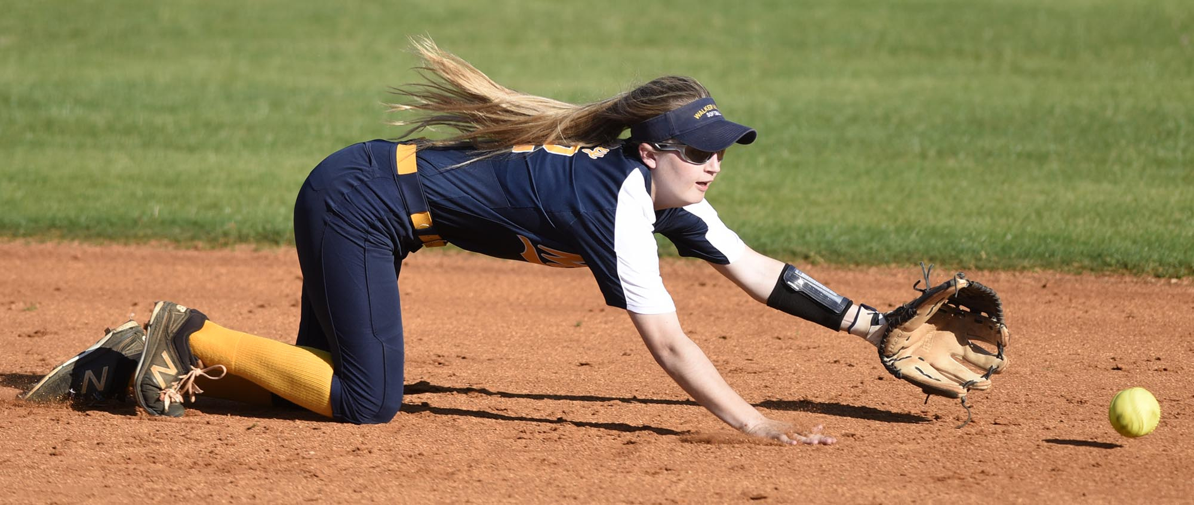 The ball just slips past diving Walker Valley shortstop Laney Harris during the Lady Mustangs' 18-0 win at East Hamilton on Wednesday.