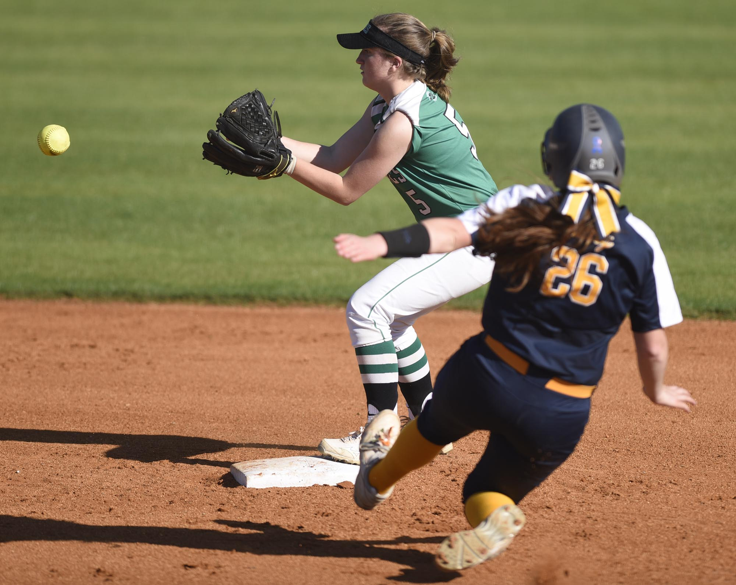 East Hamilton shortstop Sydney Batten (5) gets the force at second on Walker Valley's Kaylee Hughes (26). The Walker Valley Lady Mustangs visited the East Hamilton Lady Hurricanes in TSSAA softball action on April 10, 2019.