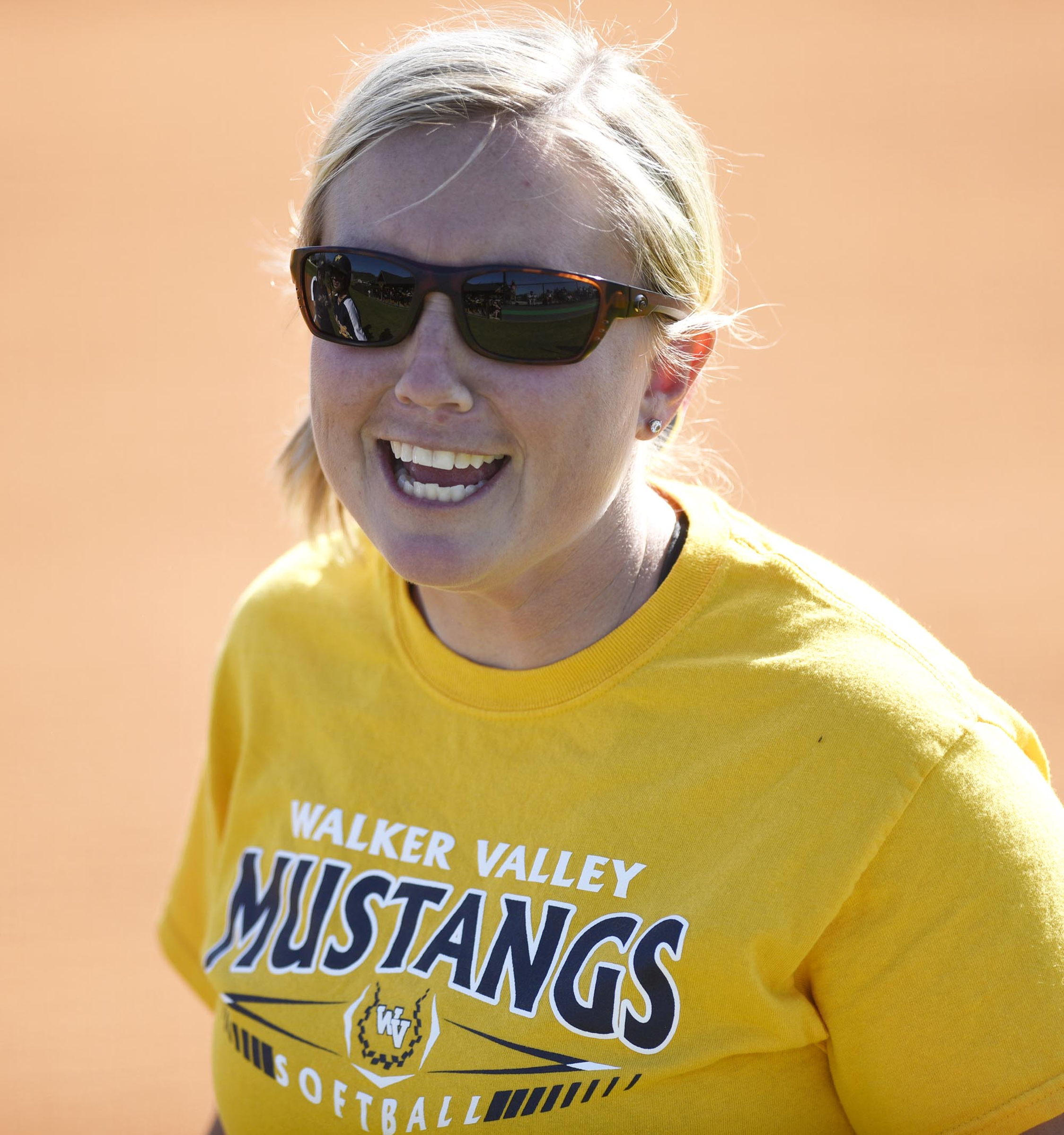 Walker Valley head coach Lauren Limburg shares a laugh with her dugout. The Walker Valley Lady Mustangs visited the East Hamilton Lady Hurricanes in TSSAA softball action on April 10, 2019.