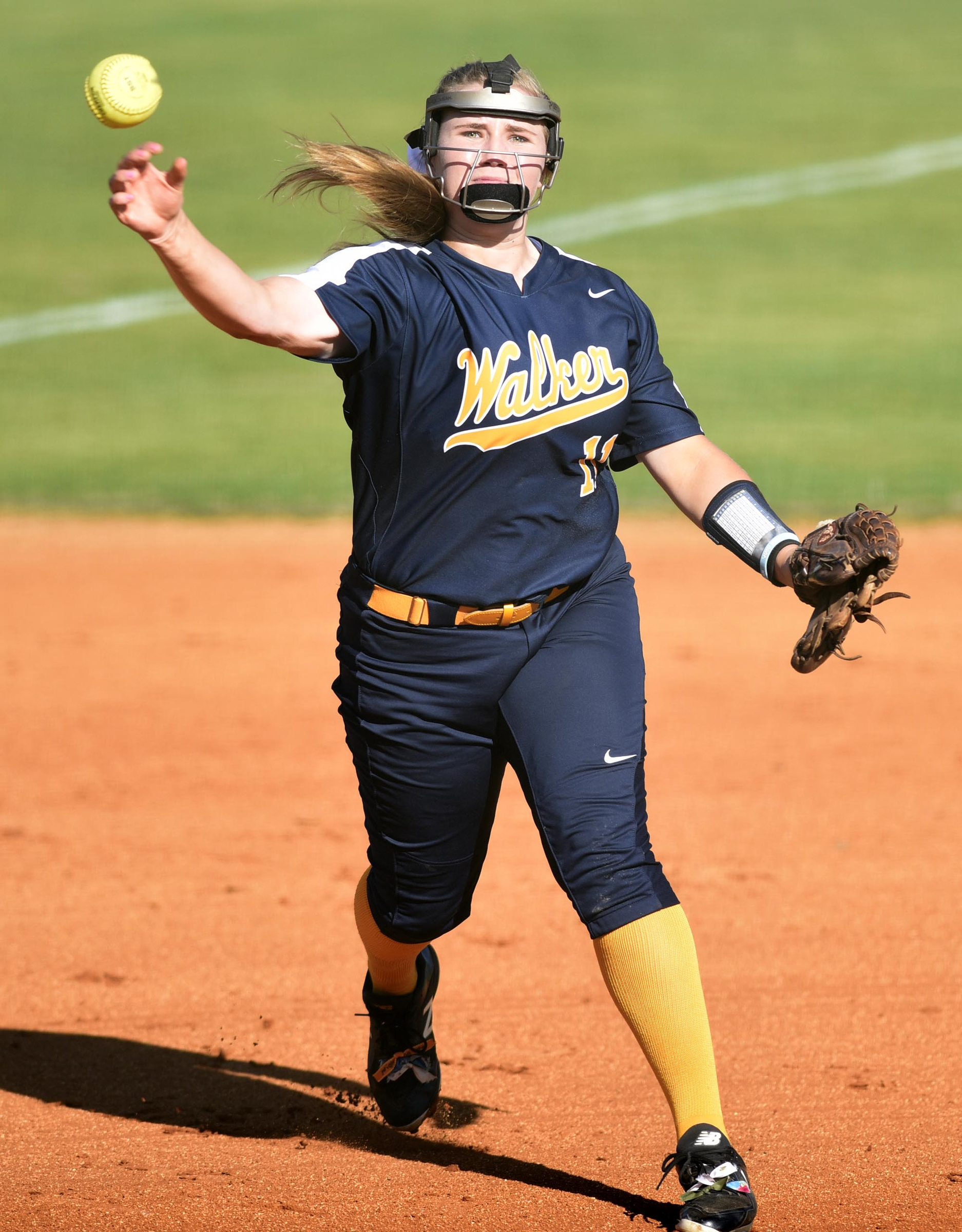 Walker Valley third baseman Hailey Leslie (11) throws out a East Hamilton runner. The Walker Valley Lady Mustangs visited the East Hamilton Lady Hurricanes in TSSAA softball action on April 10, 2019.