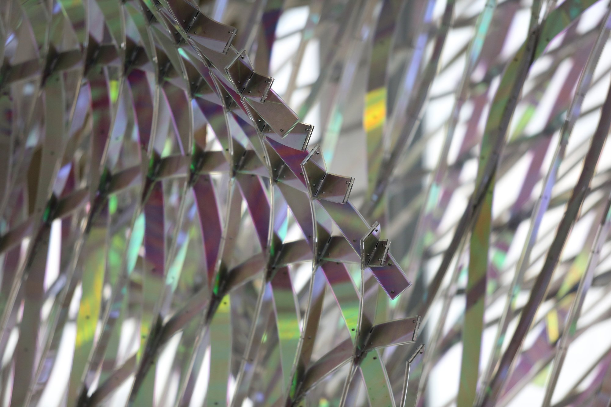 A piece titled "All Equations Are Wave Equations" by Alyson Shotz hangs at the Hunter Museum Tuesday, February 26, 2019 in Chattanooga, Tennessee. The design is made of more than 4,500 unique individual pieces.