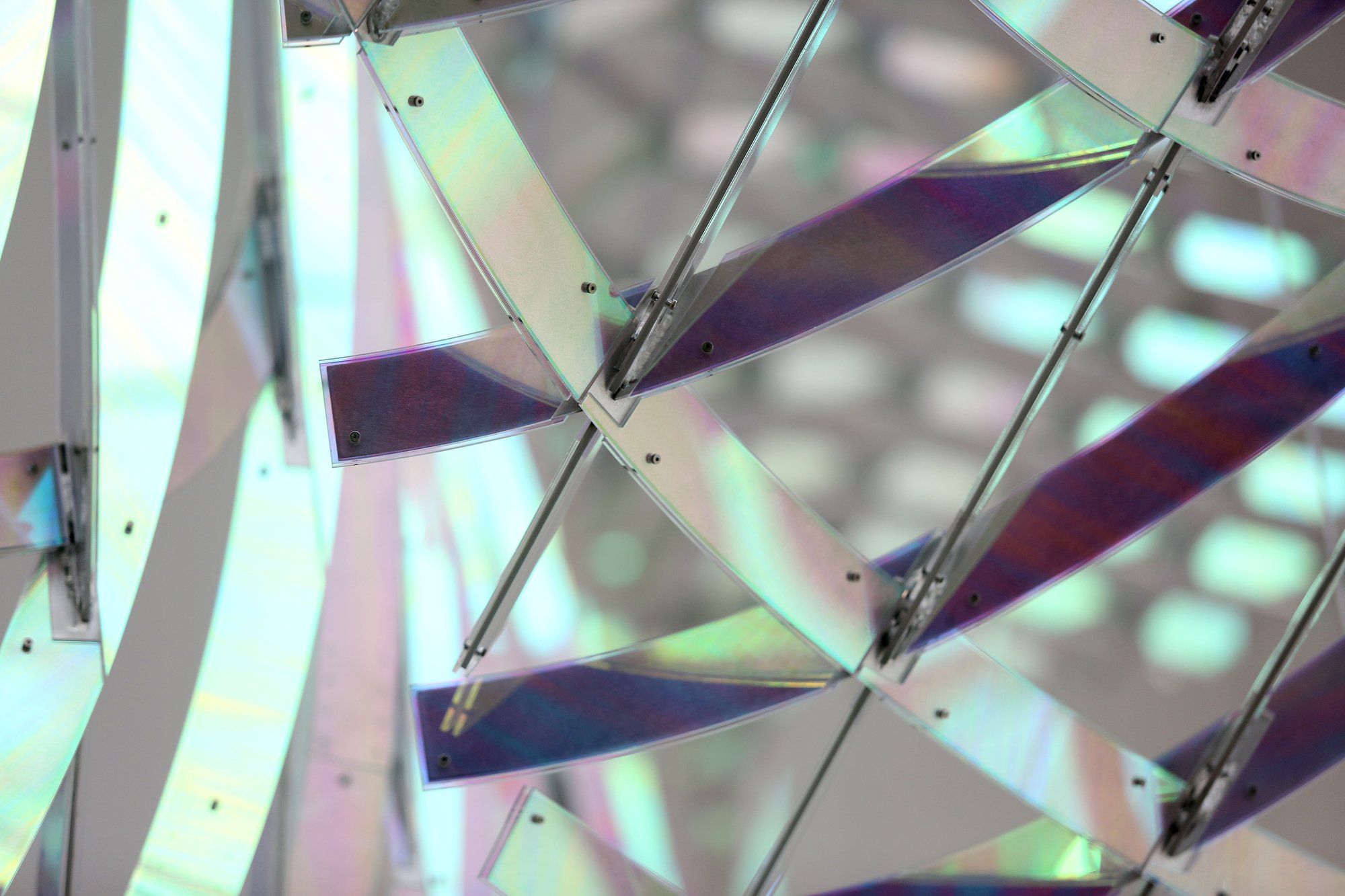 A piece titled "All Equations Are Wave Equations" by Alyson Shotz hangs at the Hunter Museum Tuesday, February 26, 2019 in Chattanooga, Tennessee. The design is made of more than 4,500 unique individual pieces.