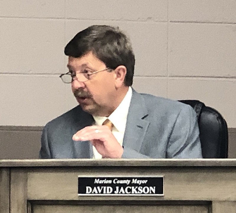 Marion County Mayor David Jackson discusses the proposed sewer line at the board's March meeting.