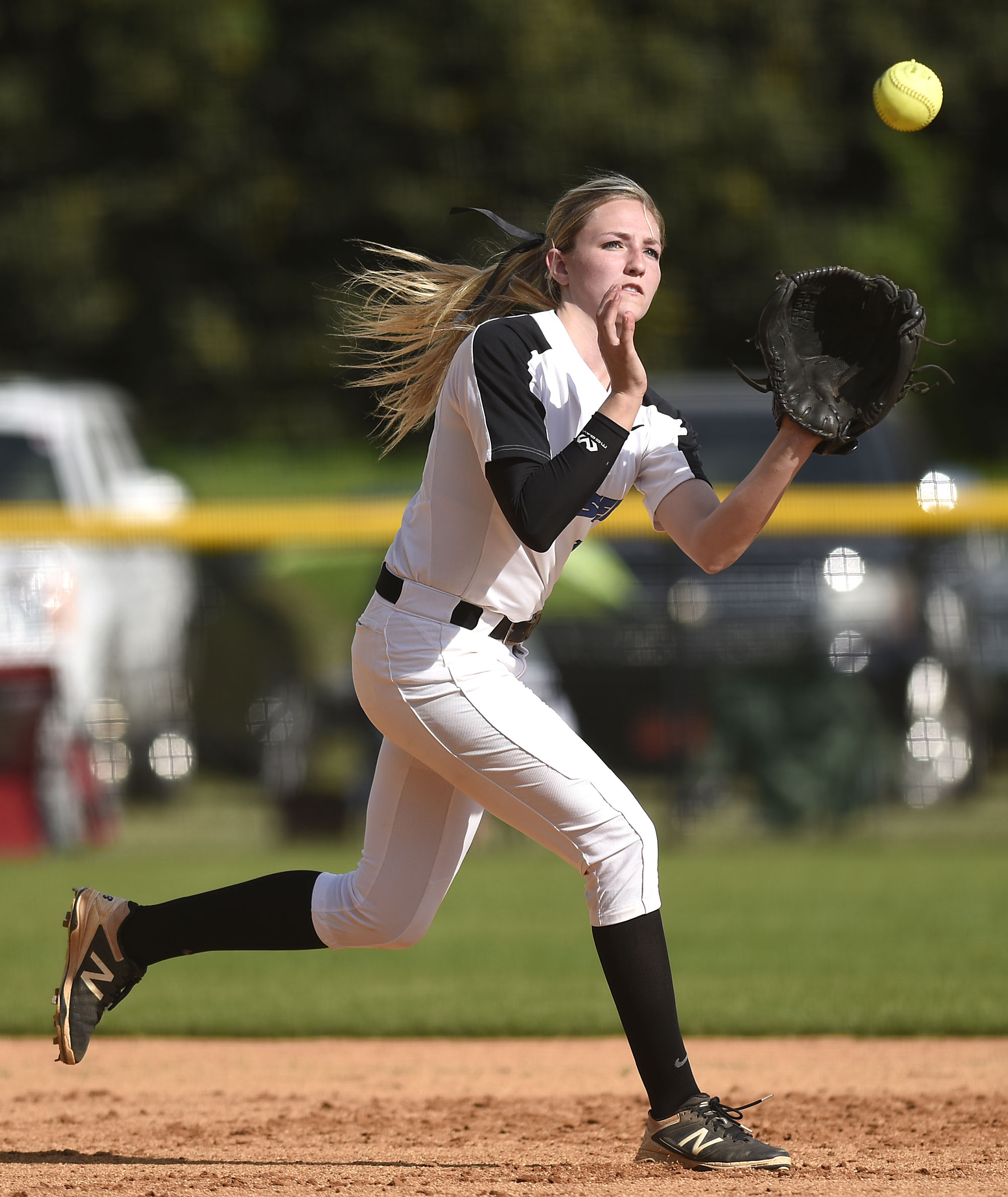 GPS shortstop Kaitlyn Songer (11) chases down a drive for a out. The Baylor Lady Raiders visited the Girls Preparatory School Bruisers in TSSAA softball action. The Bruisers won 5 to 0.