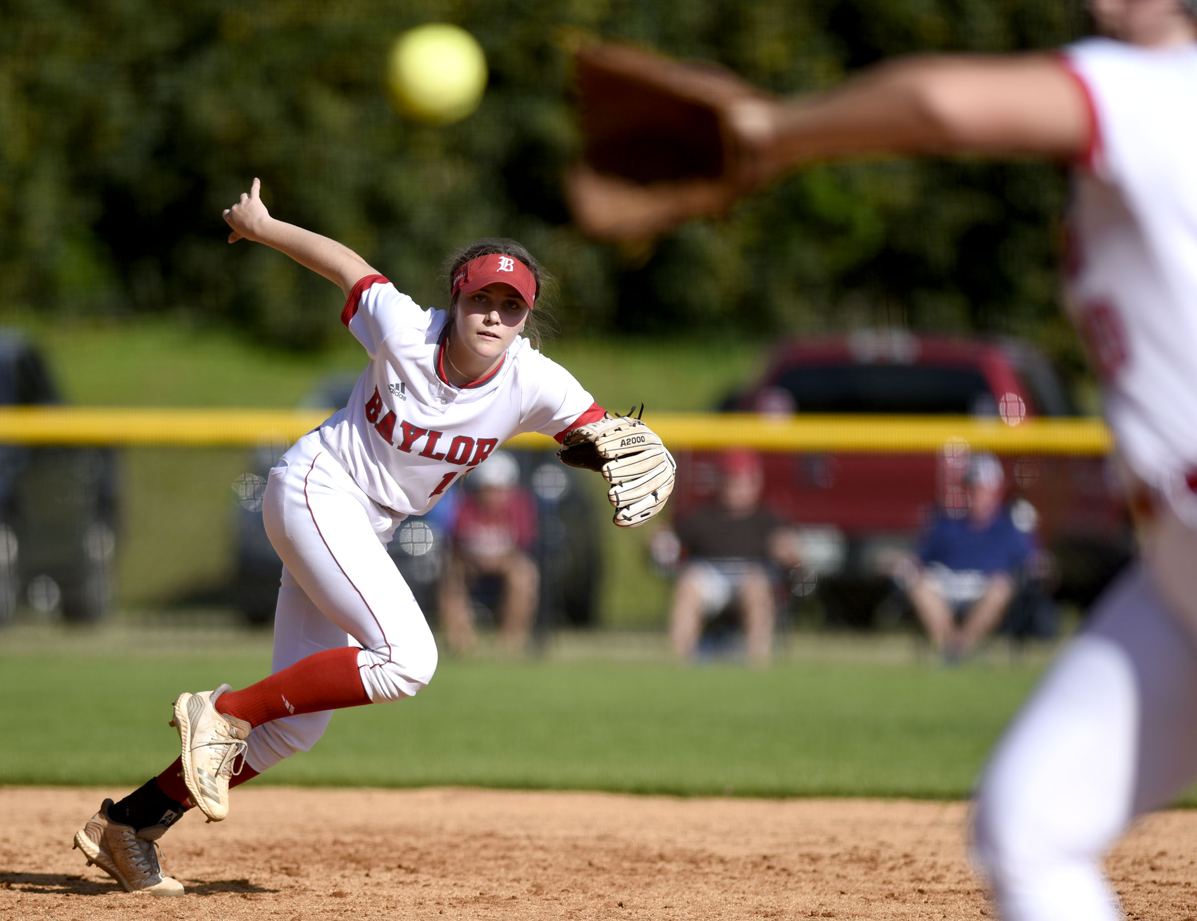 Baylor shortstop Acelyn Sellers (10) breaks on a ball that just gets past pitcher Mazy Ann McKnight. Sellers made the put out on the play. The Baylor Lady Raiders visited the Girls Preparatory School Bruisers in TSSAA softball action. The Bruisers won 5 to 0.