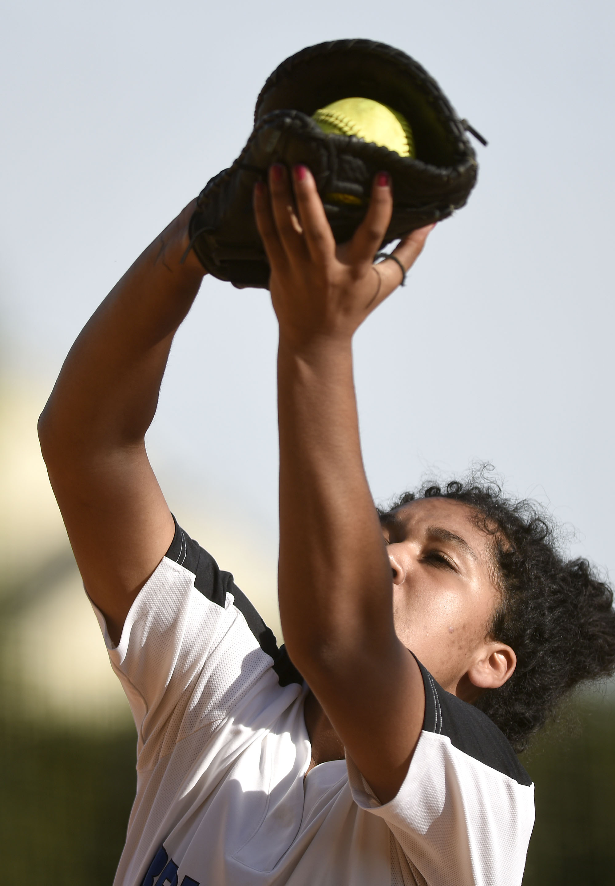 GPS first baseman Ariana Whatley (25) catches a pop up for a out. The Baylor Lady Raiders visited the Girls Preparatory School Bruisers in TSSAA softball action. The Bruisers won 5 to 0.