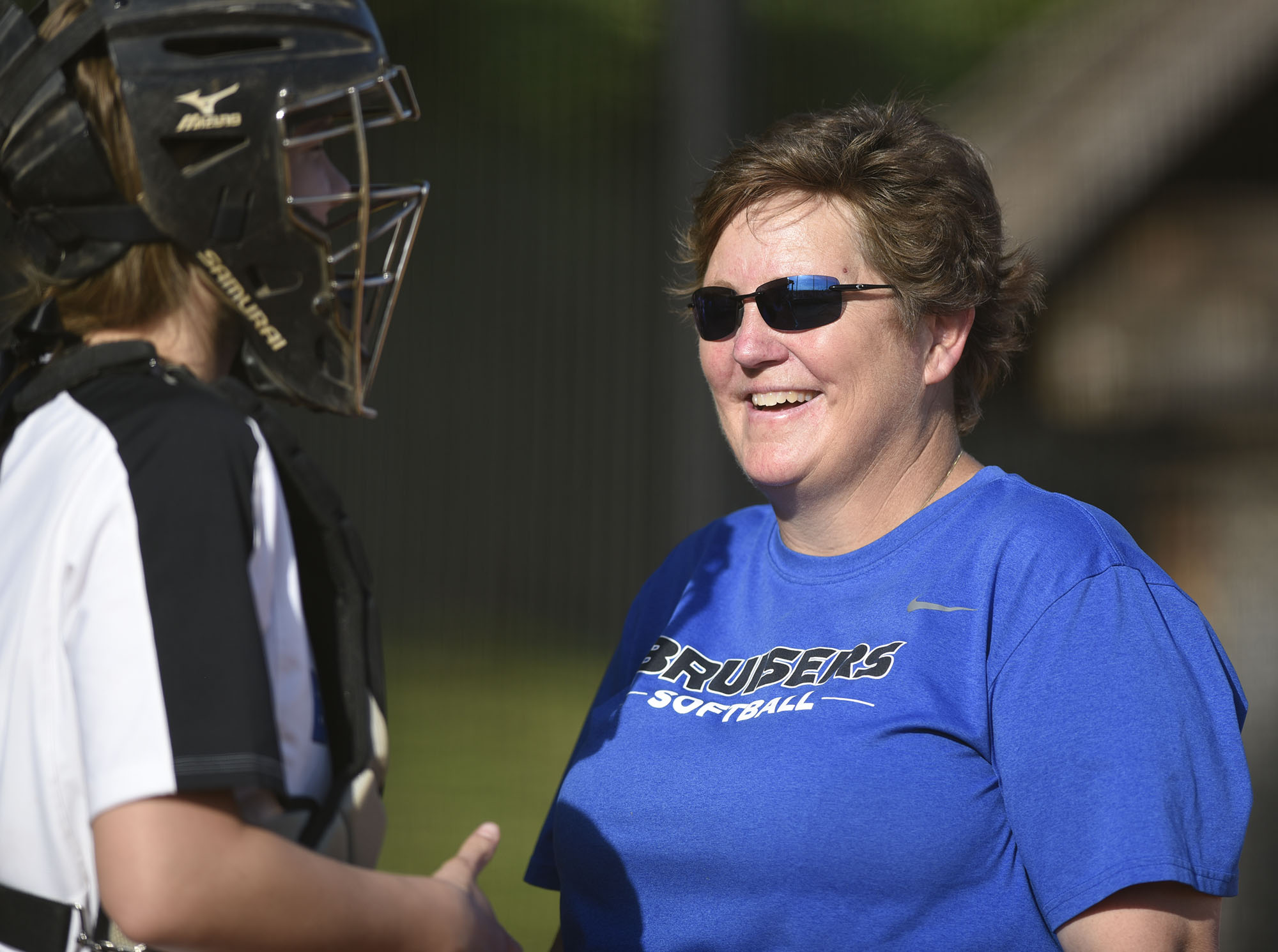 GPS head coach Susan Crownover checks on cathcer Ansley Blevins (24) was slightly injured. The Baylor Lady Raiders visited the Girls Preparatory School Bruisers in TSSAA softball action. The Bruisers won 5 to 0.