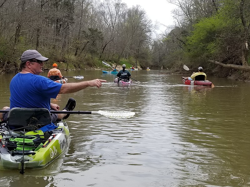 
A group floats in kayaks down West Chickamauga Creek. Battlefield Outdoors offers kayak, bike and disc golf equipment rentals at the store and Camp Jordan, as well as shuttle service to and from canoe launches along the creek for people who rent kayaks. / Photo contributed by David Bridges
