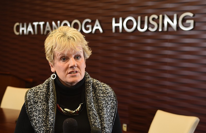 Staff file photo by John Rawlston/Chattanooga Times Free Press - Betsy McCright, executive director of the Chattanooga Housing Authority, speaks to reporters at the agency offices in 2015.