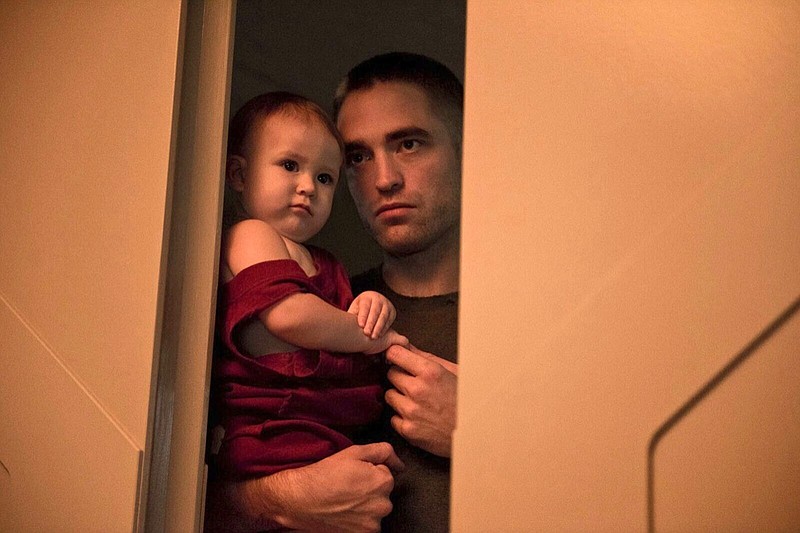 This image released by A24 Films shows Robert Pattinson in a scene from "High Life." (A24 Films via AP)
