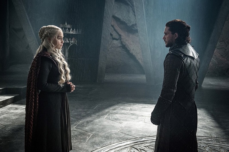 This photo provided by HBO shows Emilia Clarke as Daenerys Targaryen and Kit Harington as Jon Snow in a scene from HBO's "Game of Thrones." The final season premieres on Sunday. (Helen Sloan/Courtesy of HBO via AP)

