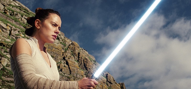 This image released by Lucasfilm shows Daisy Ridley as Rey in "Star Wars: The Last Jedi." The Skywalker saga may be coming to an end this December as the latest Star Wars trilogy finishes, but 8 months out from its release fans still know precious little about what director J.J. Abrams and Lucasfilm president Kathleen Kennedy have in store for "Episode IX," which opens nationwide on Dec. 20. (Lucasfilm via AP)