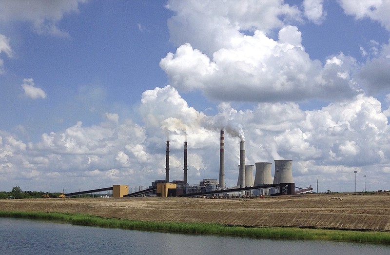 In a June 3, 2014, photo, the Paradise Fossil Plant stands in Drakesboro Ky. The new head of the Tennessee Valley Authority says a decision to shut down the Kentucky coal-fired power plant, which drew a critical tweet from President Trump, was the right one. Jeff Lyash took over as president and CEO of the nation's largest public utility on Monday, April 8, 2019. In an interview with The Associated Press on Friday, Lyash said the Paradise Fossil Plant is at the end of its life and was no longer cost effective to operate. (AP Photo/Dylan Lovan, File)