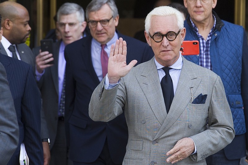 FILE - In this Thursday, March 14, 2019, file photo, Roger Stone, an associate of President Donald Trump, leaves U.S. District Court after a court status conference on his seven charges: one count of obstruction of an official proceeding, five counts of false statements and one count of witness tampering, in Washington. On Friday, April 12, 2019, Stone asked a federal judge to compel the Justice Department to turn over a full copy of special counsel Robert Mueller's report on the Russia investigation as part of discovery in his criminal case. (AP Photo/Cliff Owen, File)

