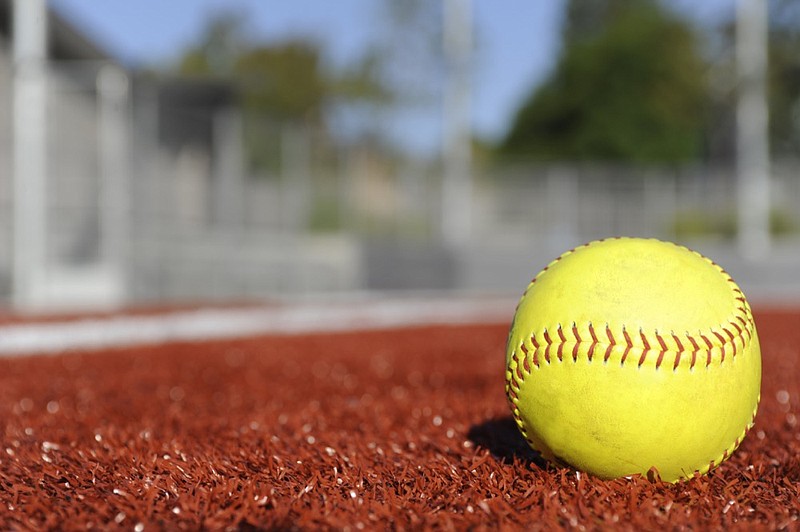 
A well used yellow softball on the infield Artificial Dirt. softball tile / Getty Images