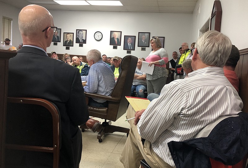 Linda Mason, who handles Jasper's municipal court clerk duties as well as property taxes and business licenses, talks about city employees' unhappiness with a change in retirement plans during the April meeting of the Jasper Board of Mayor and Aldermen.