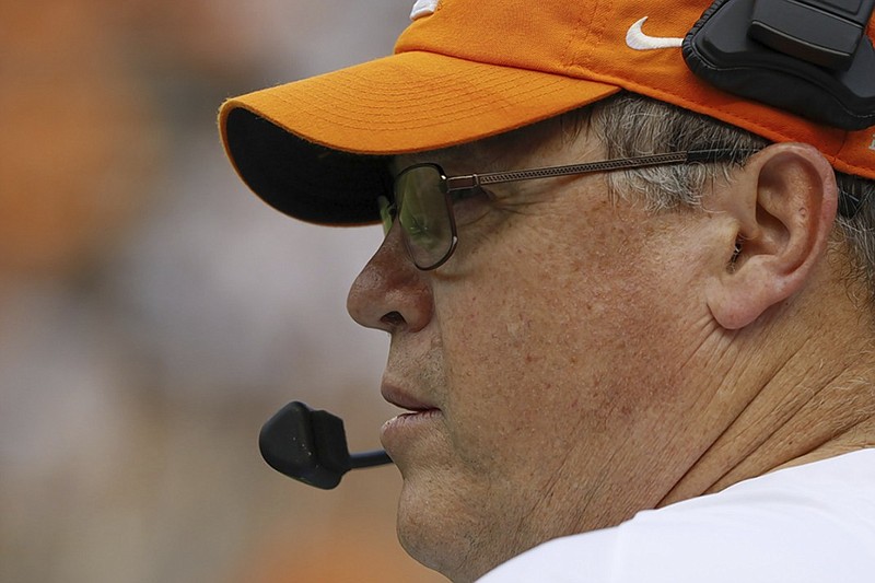 First-year Tennessee offensive coordinator Jim Chaney looks on during the Orange and White spring football game at Neyland Stadium in April.