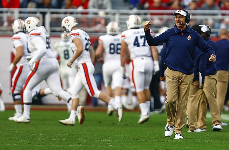 Auburn football coach Gus Malzahn, shown during last season's Iron Bowl rivalry game against Alabama, said he hopes to settle on some "order" for the team's four quarterbacks now that the Tigers' spring football session is over.