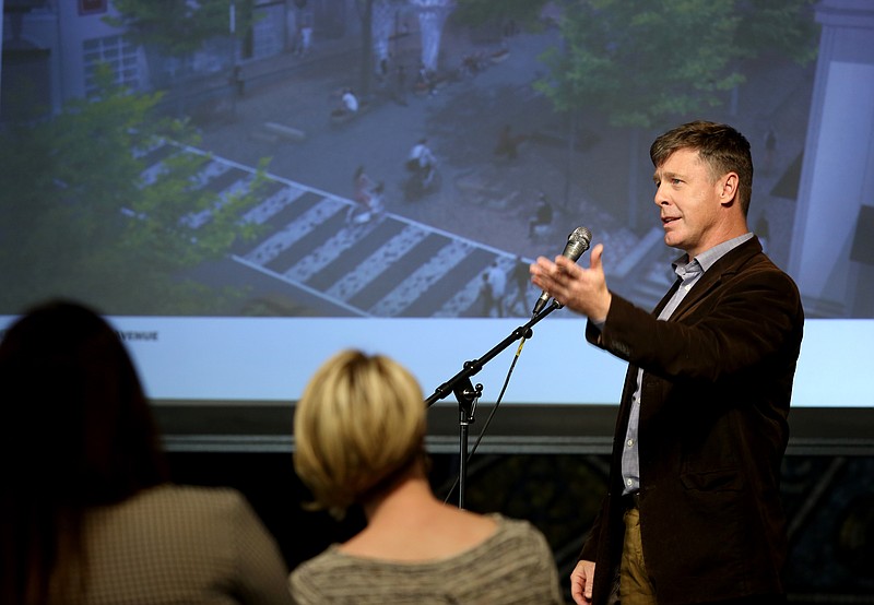 Matt Whitaker, a landscape architect with WMWA, talks about the design for the Patten Parkway redesign at The Camp House Monday, April 15, 2019 in Chattanooga, Tennessee. The renovation project was designed to reflect the cityճ past and promote its innovative future