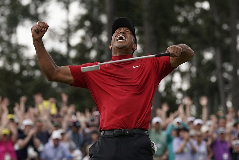 Tiger Woods reacts as he wins the Masters golf tournament Sunday, April 14, 2019, in Augusta, Ga. (AP Photo/David J. Phillip)