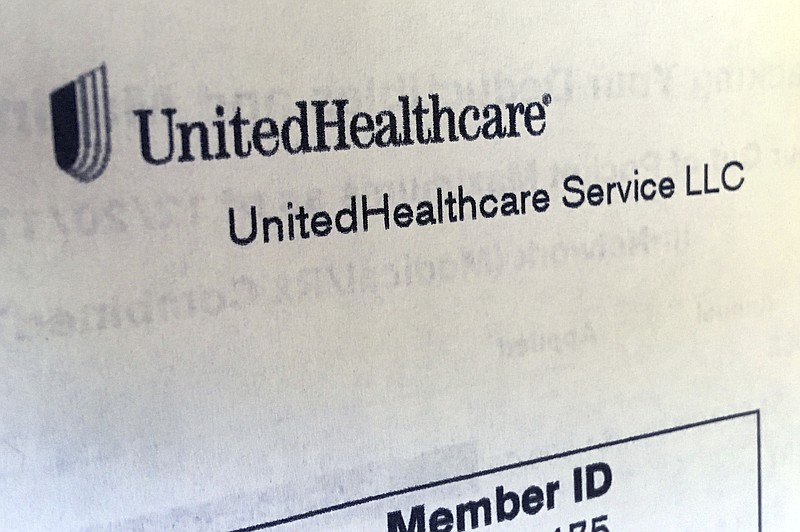 FILE - In this June 15, 2018 file photo, United Healthcare correspondence is seen in North Andover, Mass. UnitedHealth Group is reporting strong first-quarter driven by its main insurance business, as well as its pharmacy benefits division.  The Minnetonka, Minn., company on Tuesday, April 16, 2019 reported net income of $3.47 billion, or $3.56 per share. Earnings, adjusted for amortization costs, were $3.73 per share, topping Wall Street estimates by 13 cents, according to a survey by Zacks Investment Research.  (AP Photo/Elise Amendola, File)